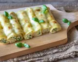 Gebackene Cannelloni mit einer cremigen Füllung und frischem Basilikum, ein köstliches Cannelloni Rezept.